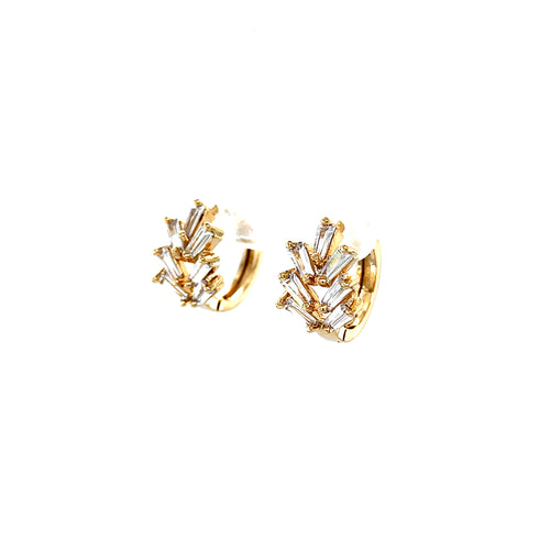 A pair of Zirconia Stones Huggies earrings 10k gold-filled, featuring a zigzag pattern with sparkling zirconia stones, set against a plain white background.